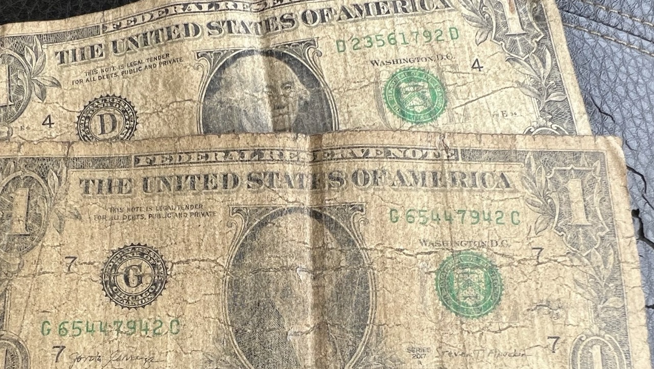 Worn and torn US dollar banknotes circulating in Zimbabwe